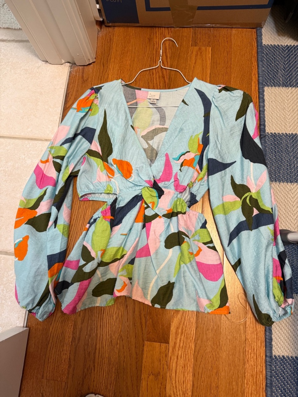 Light Blue Floral V-Neck Peplum Top